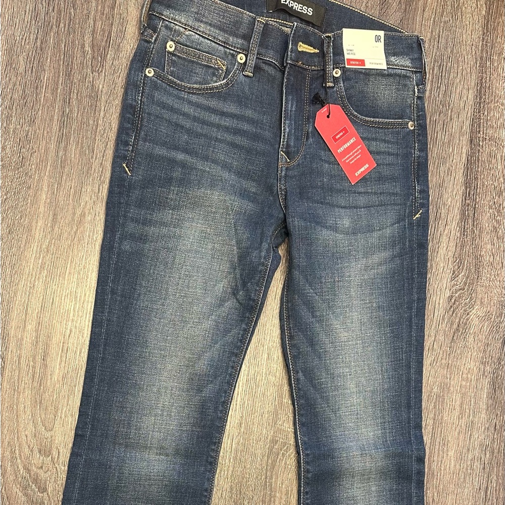 Express Mid Rise Skinny Jeans